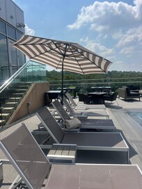 Rooftop pool with outdoor firepit