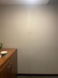 Wall with black spots