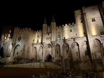 Popes Palace at night