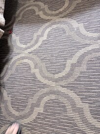 Crumbs and soda cap on the floor