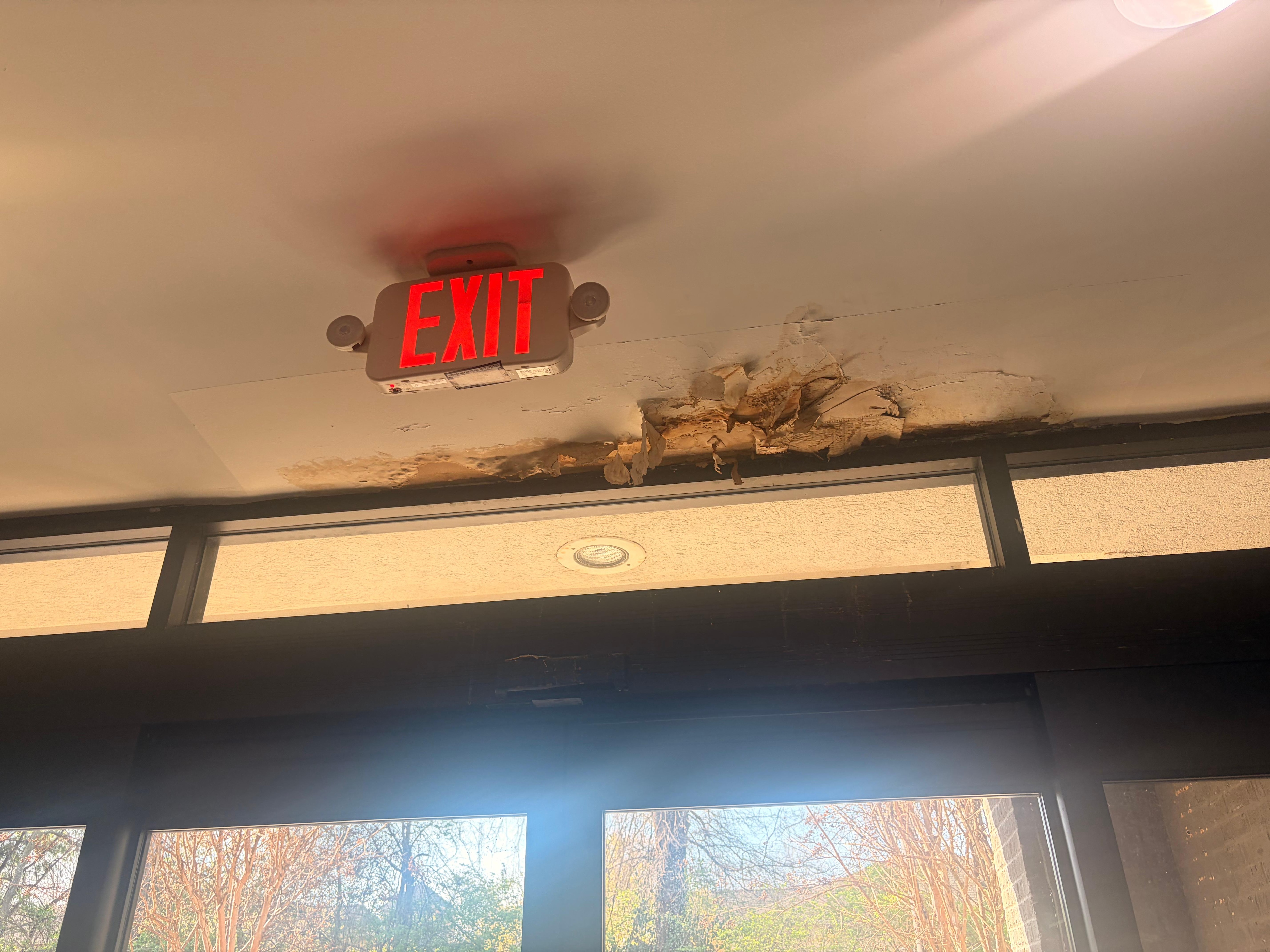 In the lobby by the elevators 