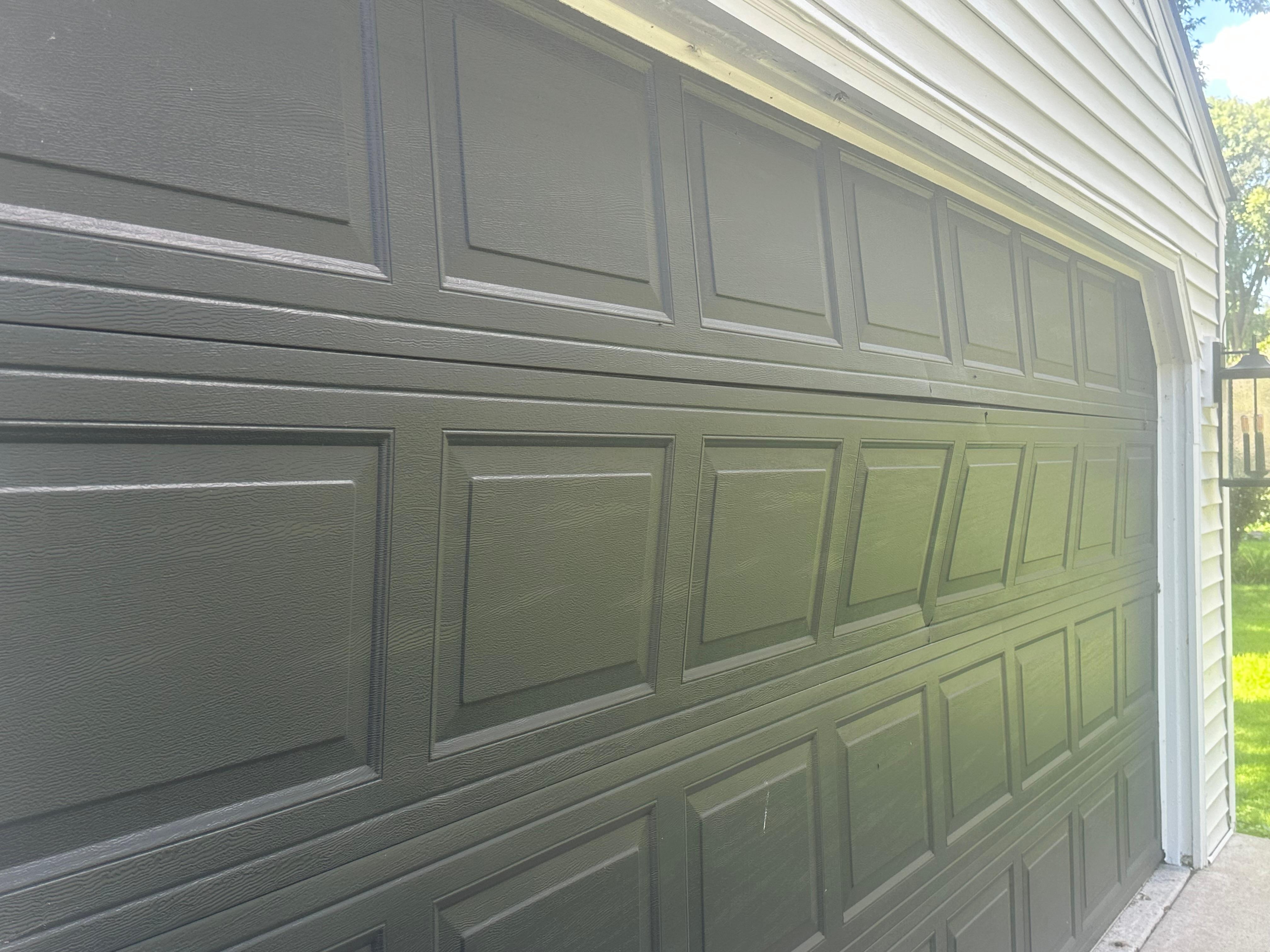 Buckled garage door, to which we didn’t have access.