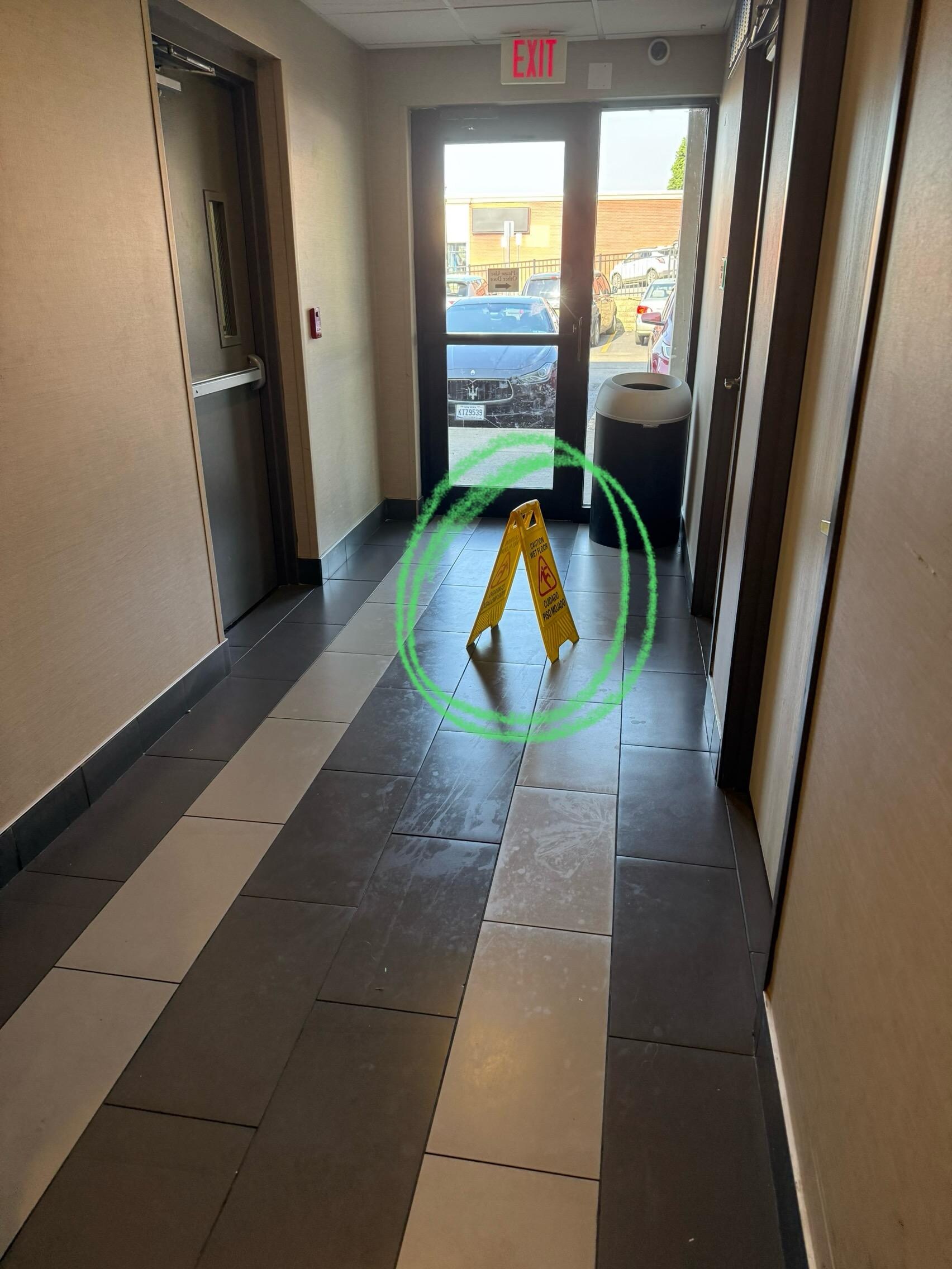 One of several “wet floor” signs that are never put away