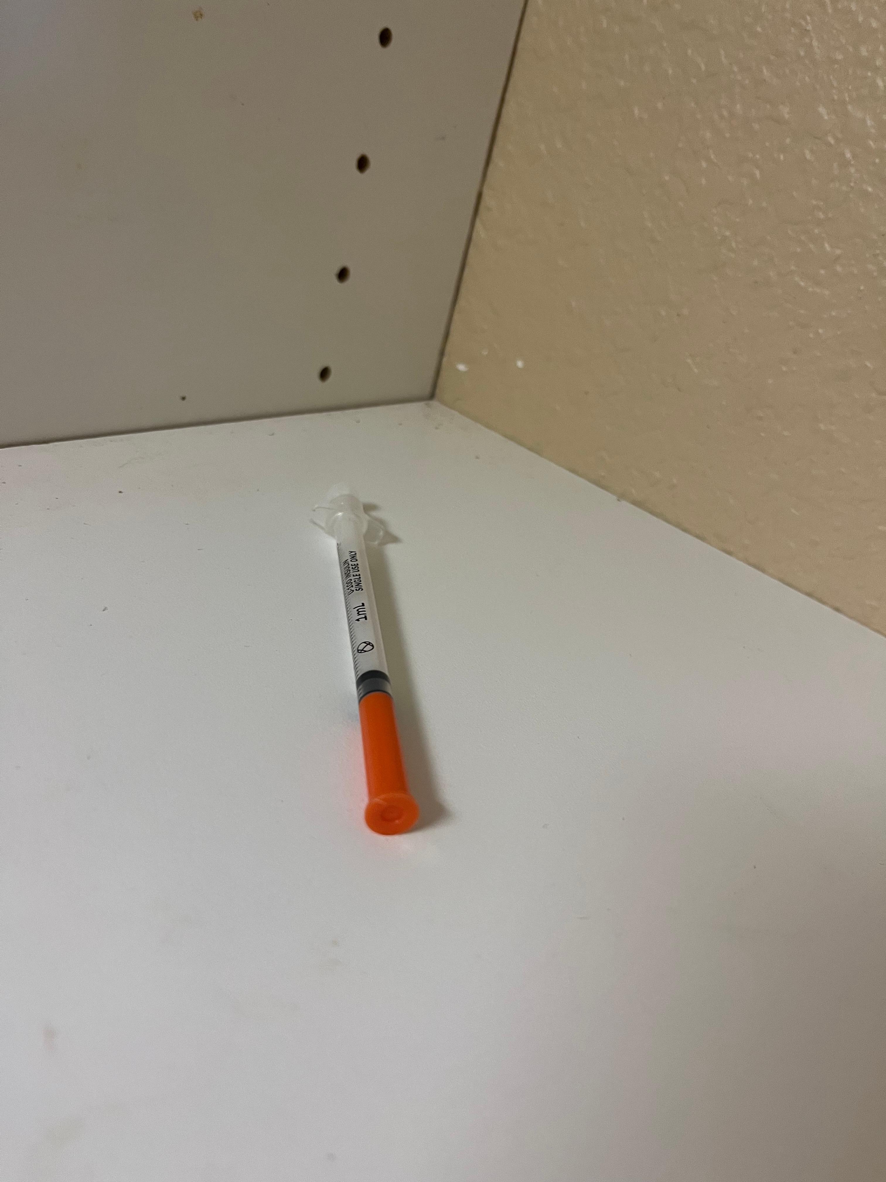 Hypodermic needle  found in kitchen drawer