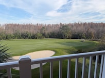 View of golf course from room balcony.