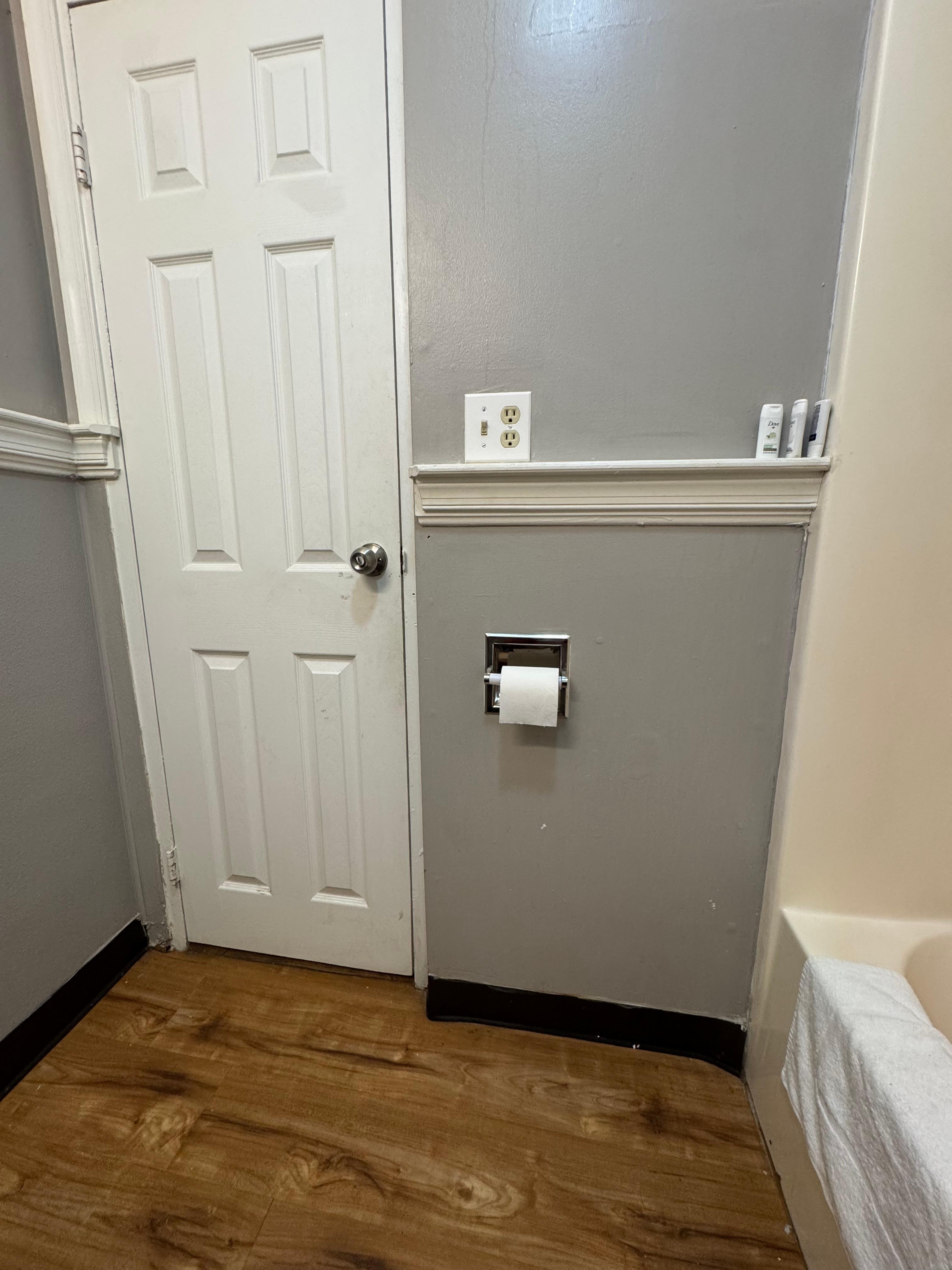 The area on the door around the knob hasn’t been cleaned in a while and there are questionable splatters on the walls that I don’t want to think to hard about.