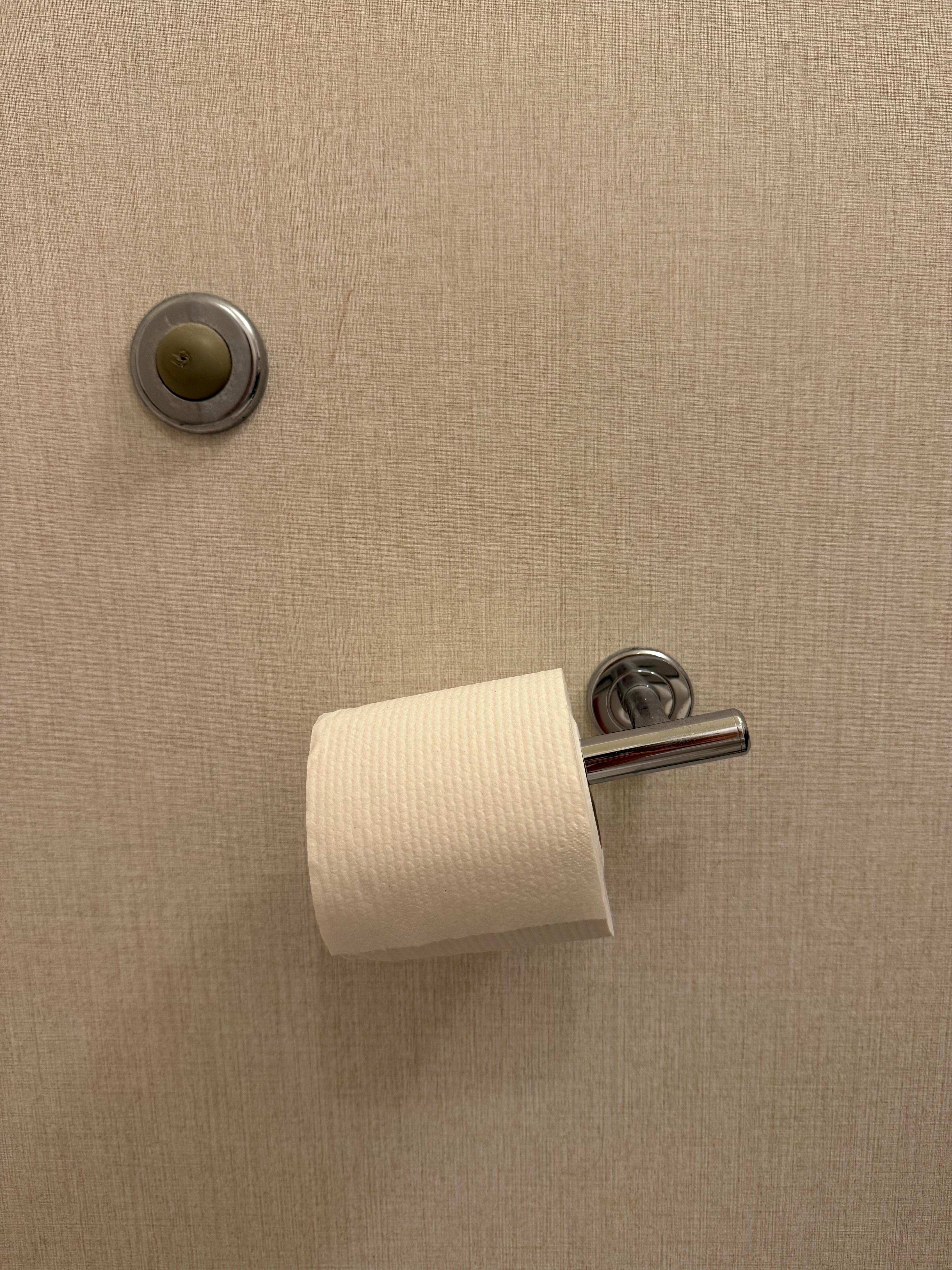 Toilet paper holder wouldn’t stay up and roll kept sliding off. 