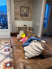 Super comfortable living room area overlooking city scene