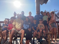 Me my husband. Our three children with their spouses and all of our wonderful Grands!!