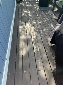 Deck looks nothing like the photos, it is very hazardous and not maintained. Loose boards, raised boards and nails sticking up on all three levels.