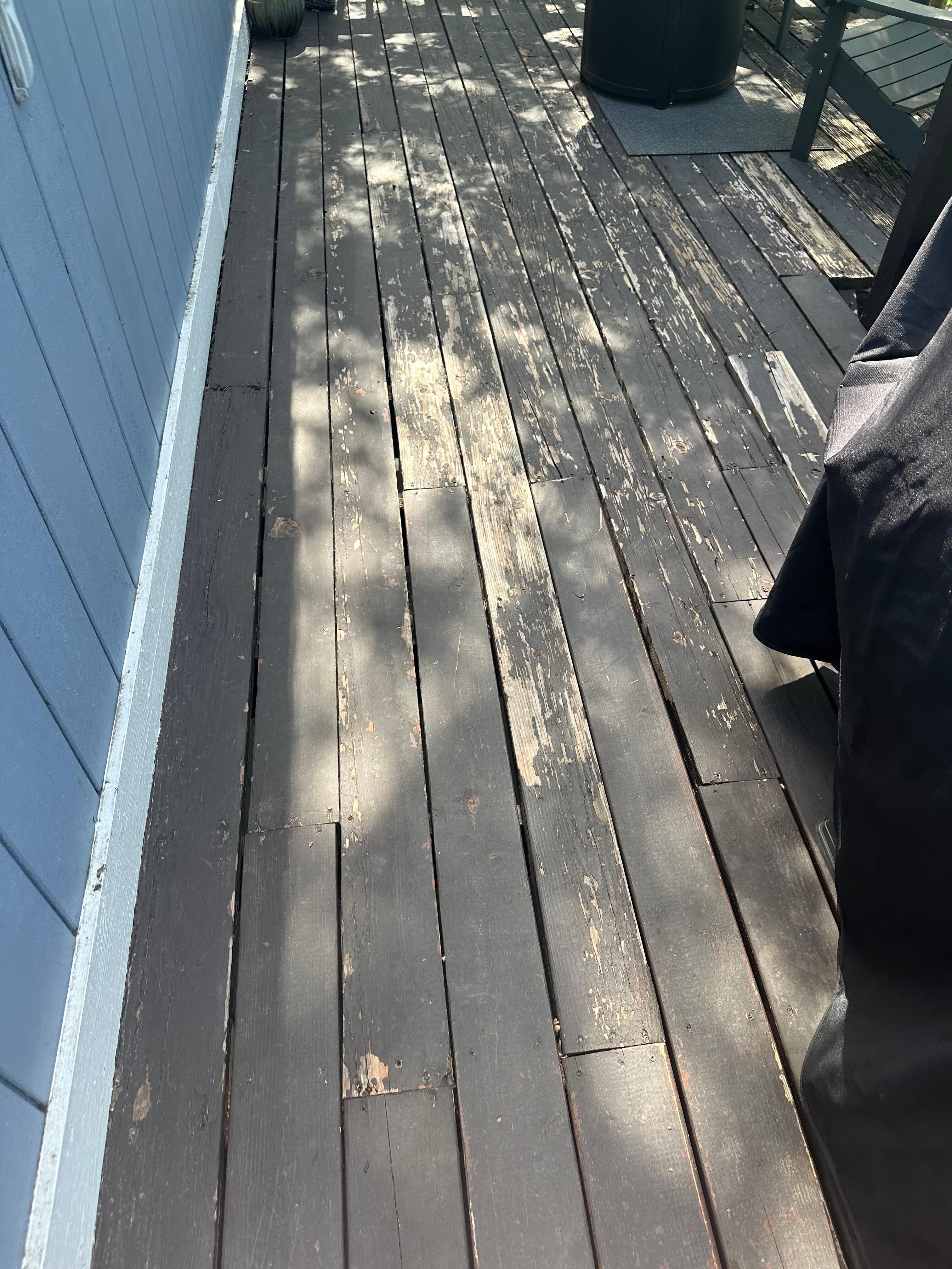 Deck looks nothing like the photos, it is very hazardous and not maintained. Loose boards, raised boards and nails sticking up on all three levels.