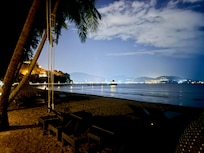 Beach and pier on property