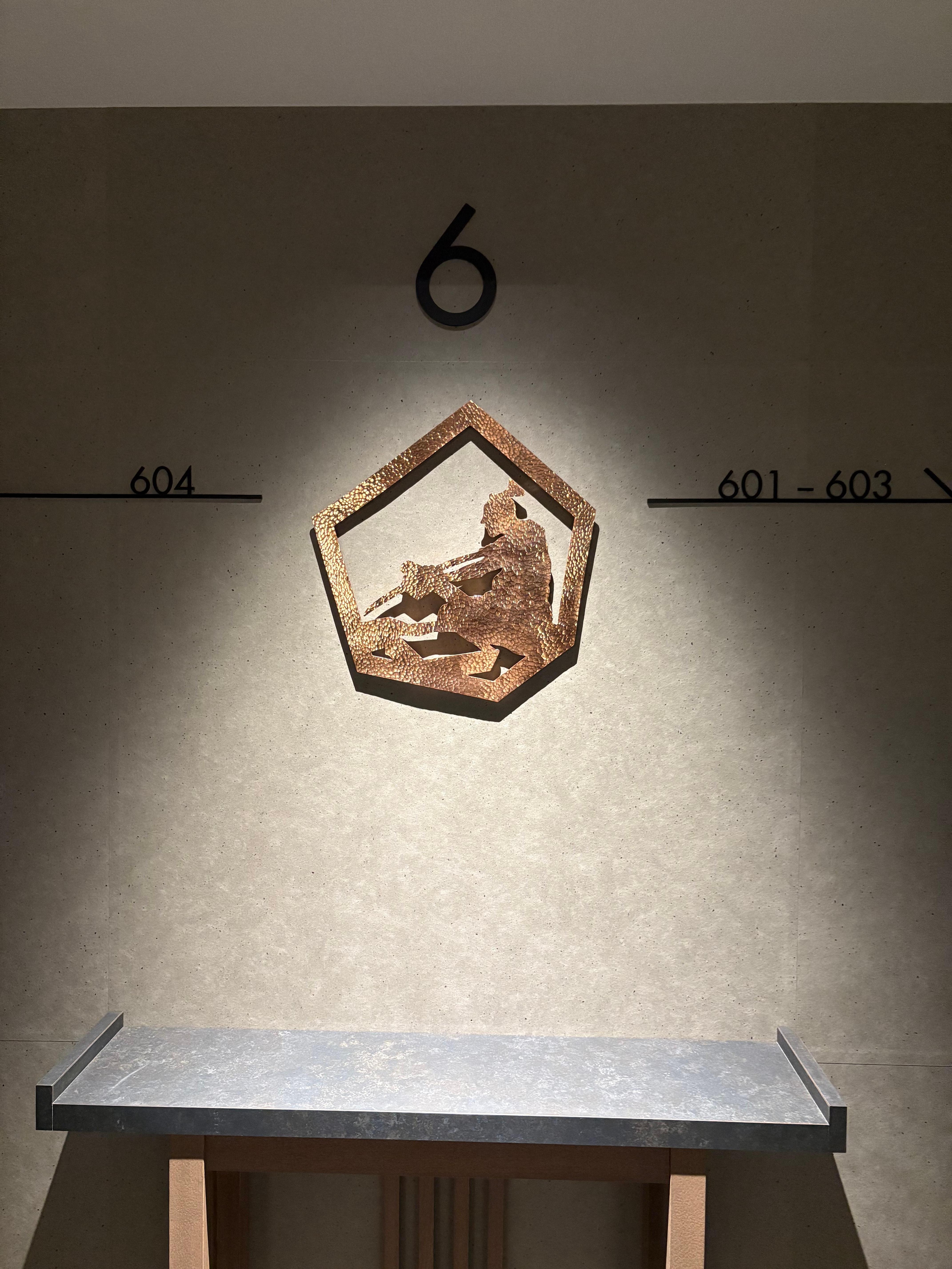 Each floor had a different little bronze art piece.