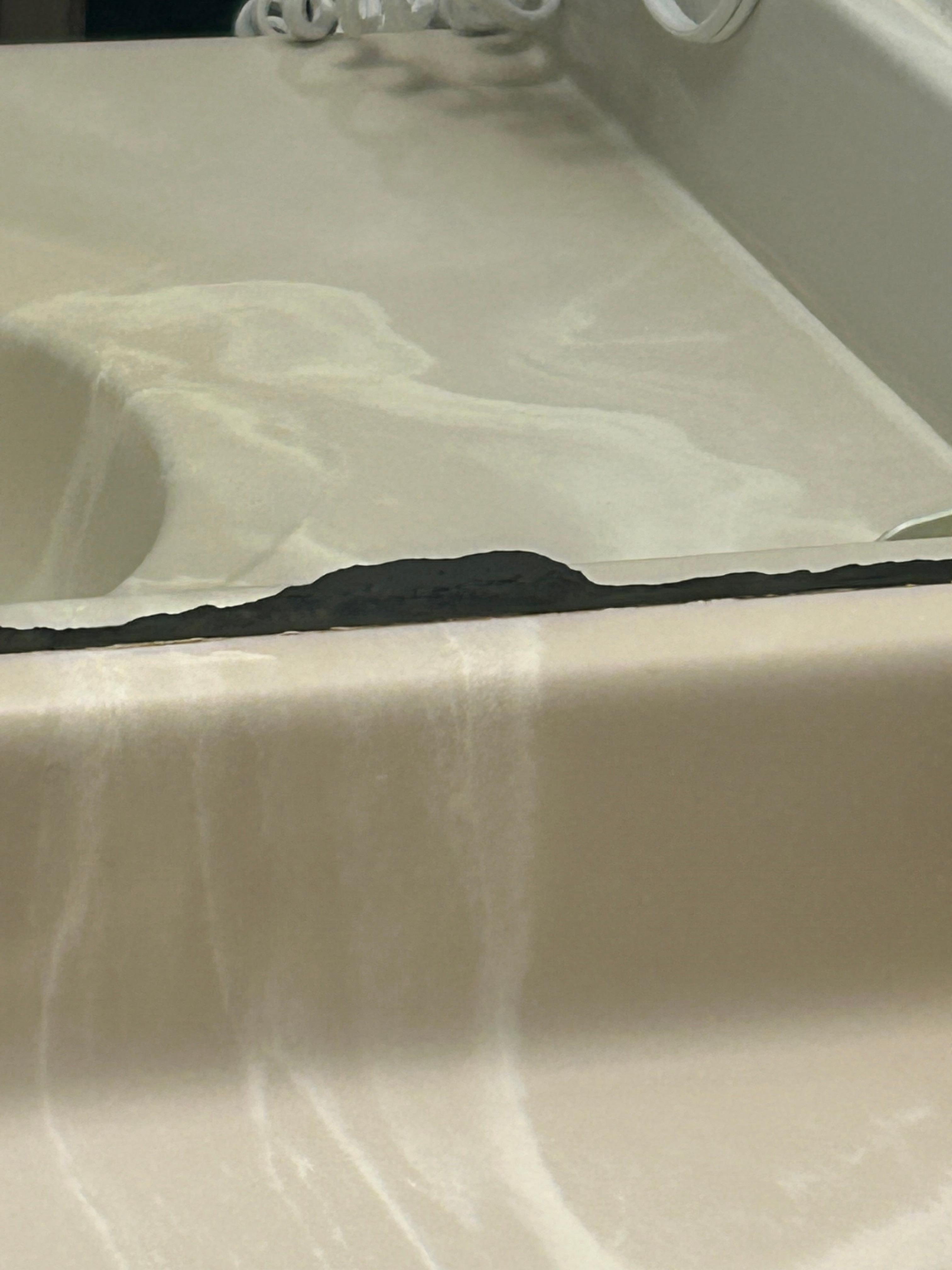 Bottom of bathroom mirror