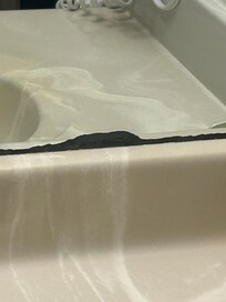 Bottom of bathroom mirror