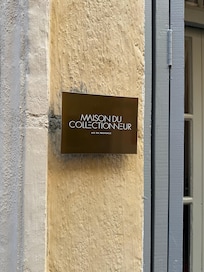 A small sign is all you’d know from the exterior that this is a hotel.