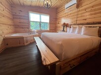 Bedroom one with spa tub