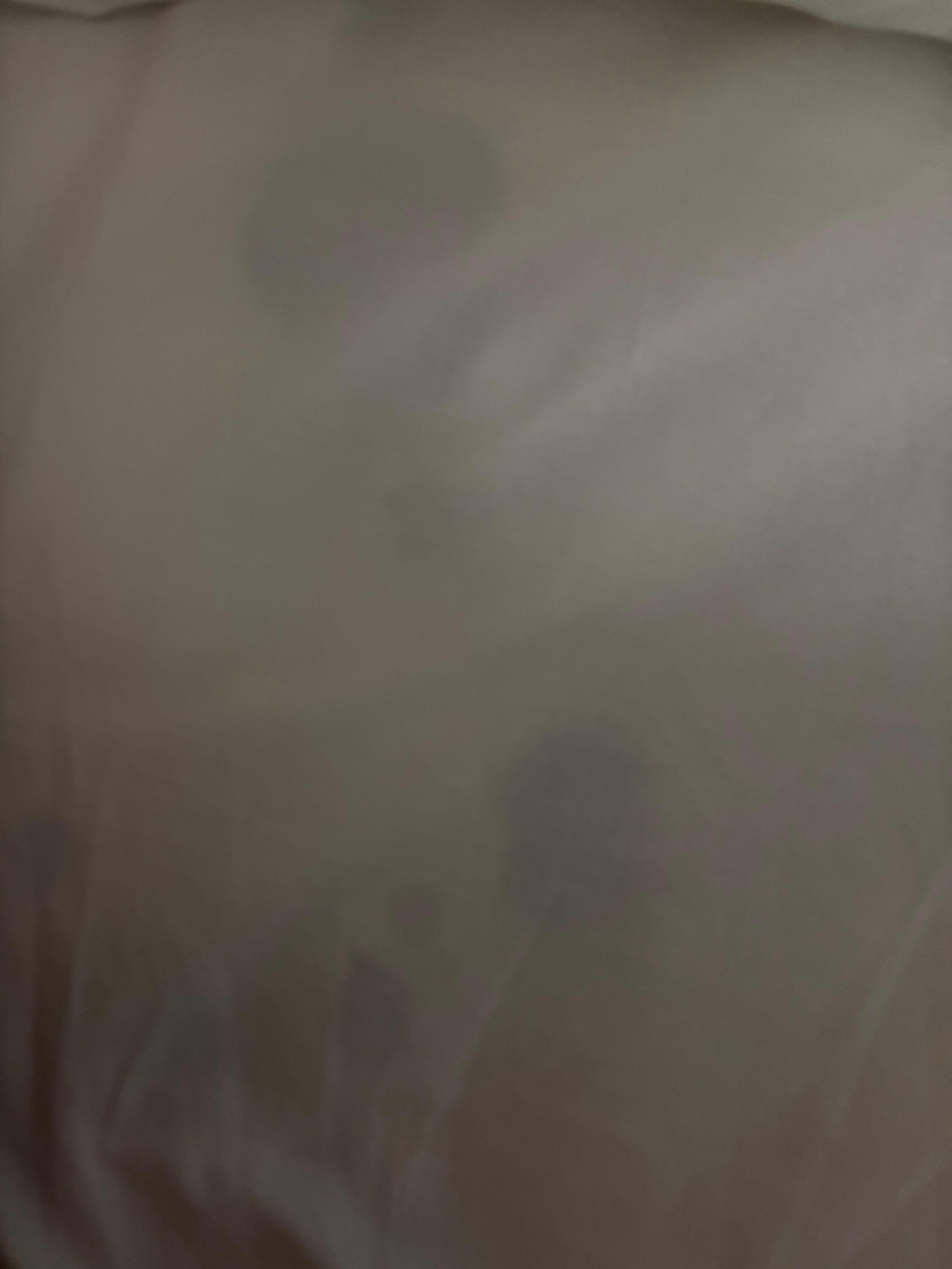 Stains on mattress under sheet