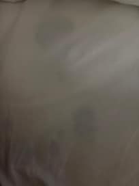 Stains on mattress under sheet