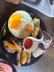 Unappealing half cooked over easy eggs that management informed me are normal in Guatemala.