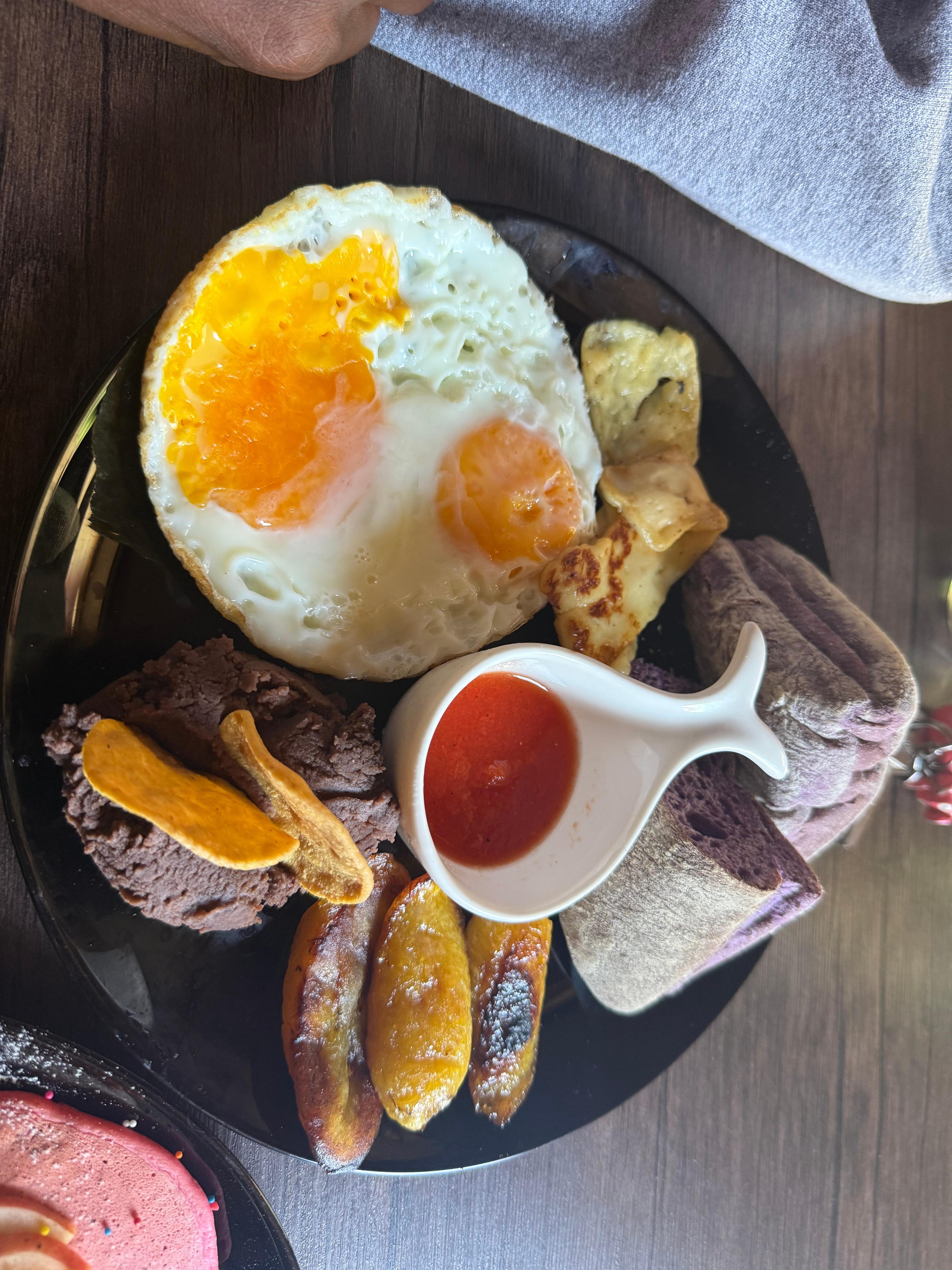 Unappealing half cooked over easy eggs that management informed me are normal in Guatemala.