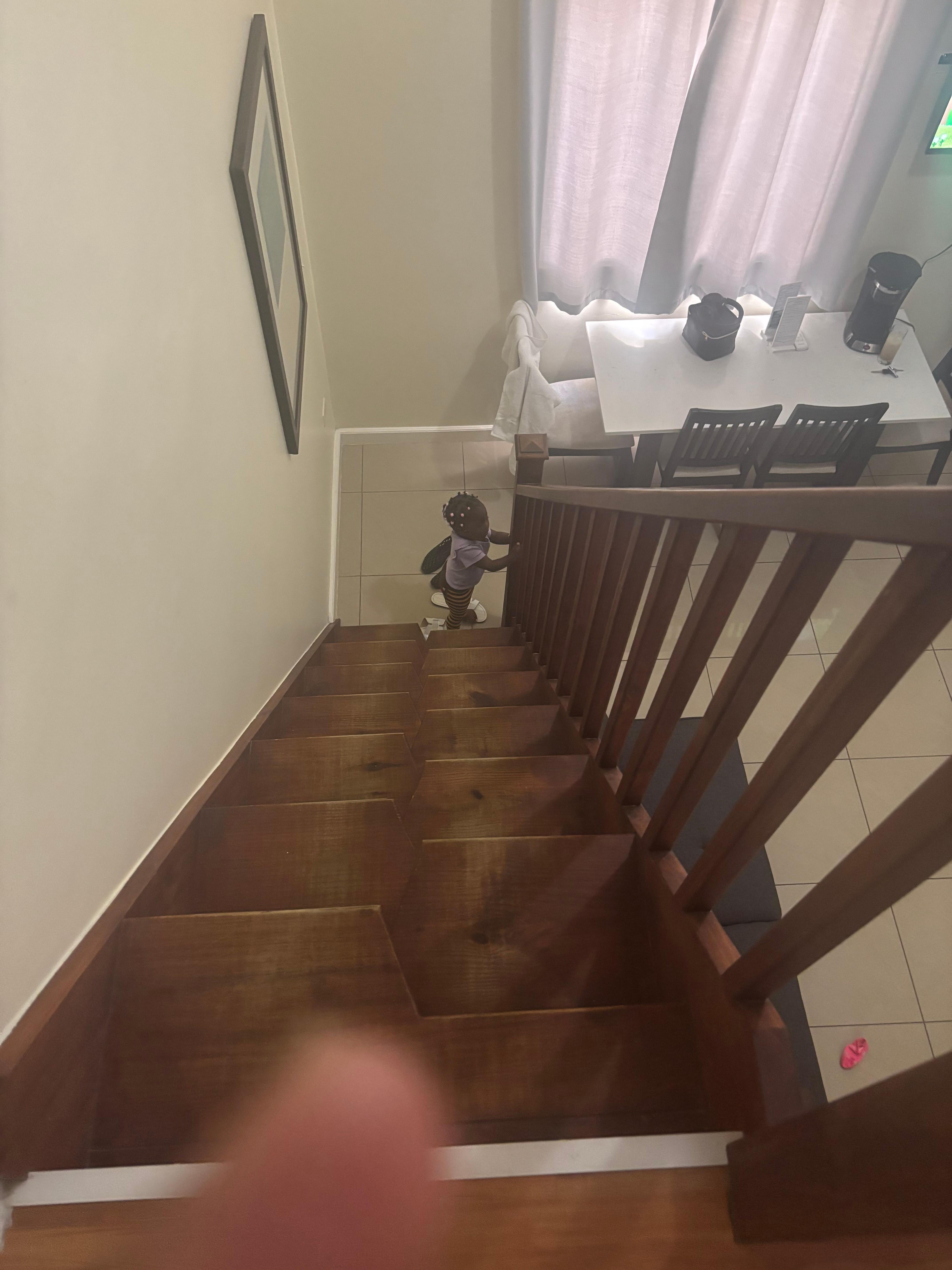 Staircase leading up to a loft area