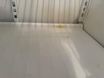 Spills on the refrigerator not cleaned up; refrigerator over-all looked like it needed to be wiped out.