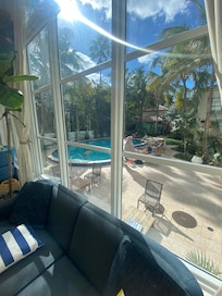 View of pool from sun room