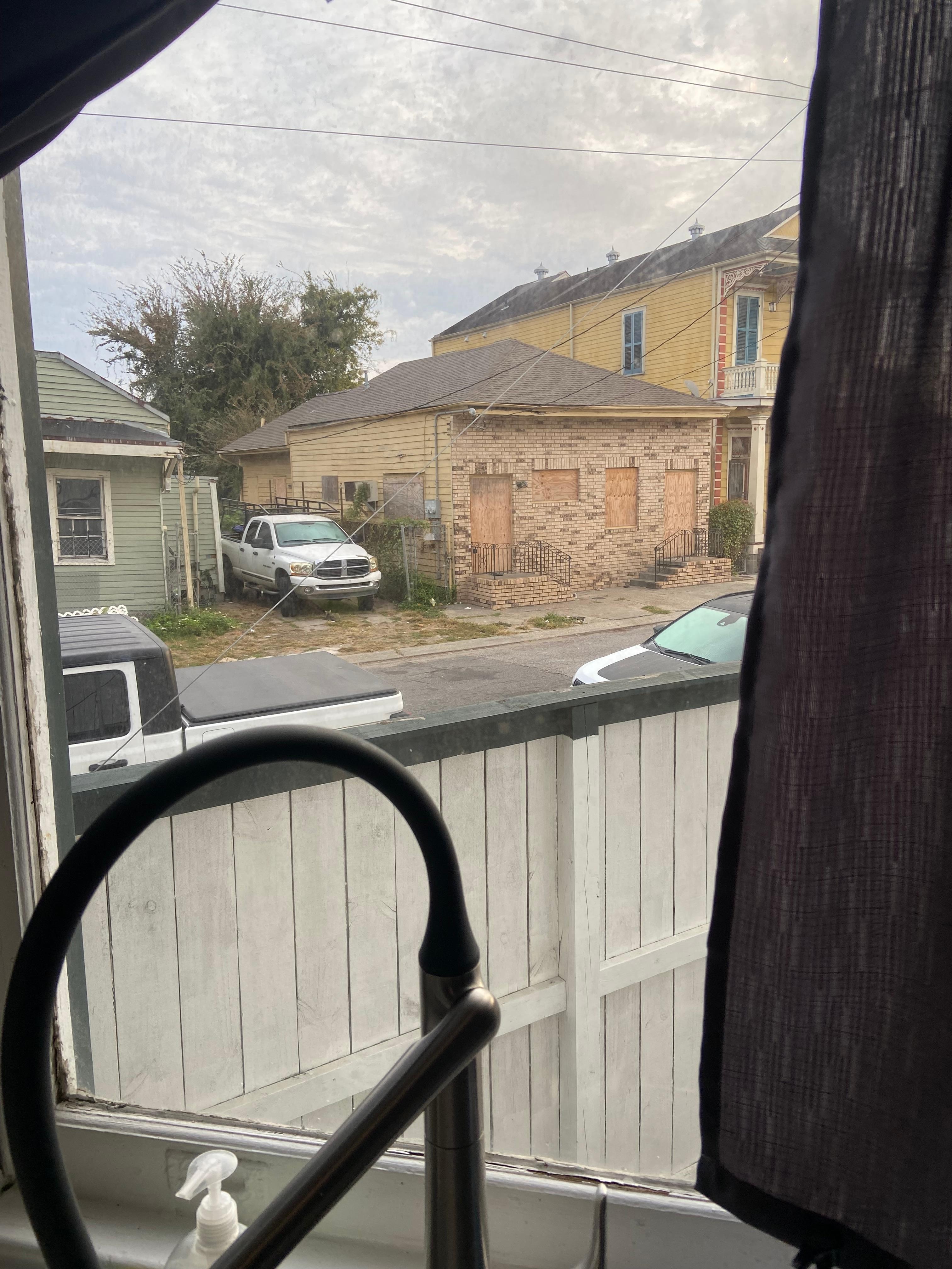 View from kitchen, this was taken in early morning but there were often people sitting/sleeping/using drugs here in evenings. We kept our shades drawn.