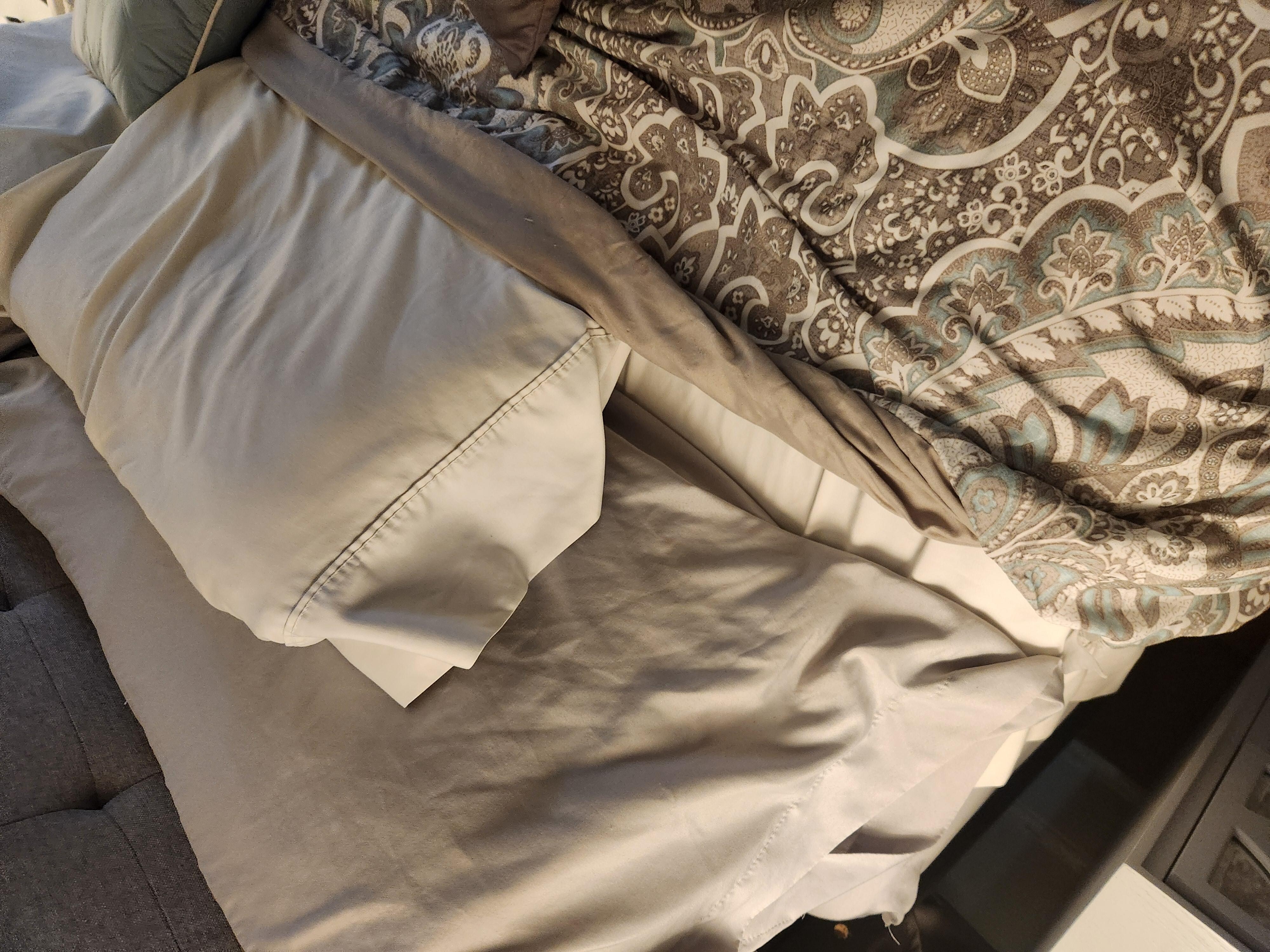 Unmade bed and probably dirty sheets