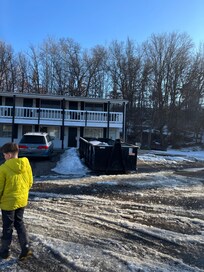 Dumpster that had been there a while. In other areas on the property we found discarded mattresses and air conditioners just lying about. A dump basically.