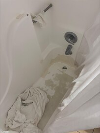 Bath tub coating peeling and clogging drain