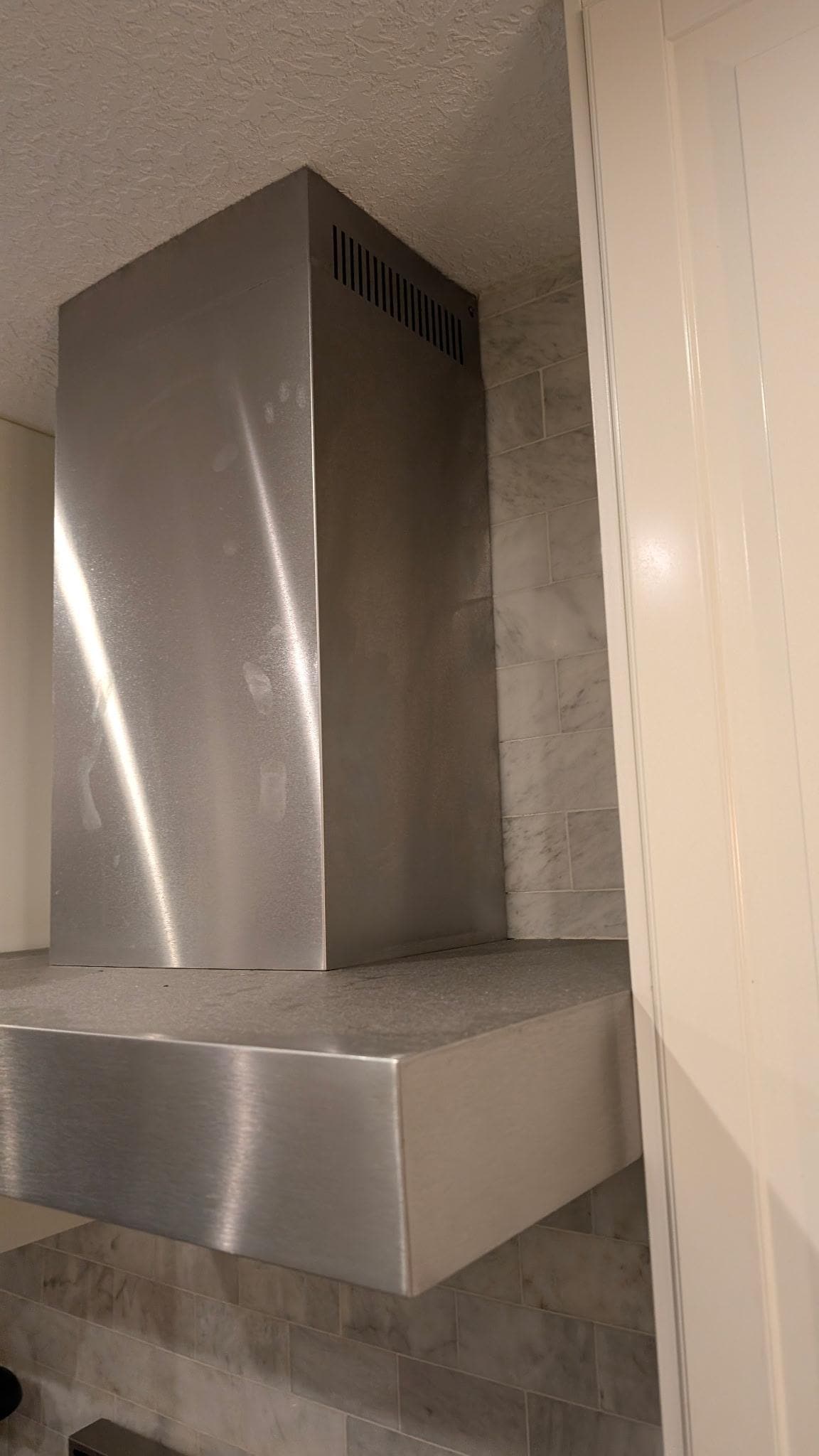 Kitchen recirculating exhaust grandfather acceptance but doesn’t meet current safety codes