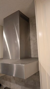 Kitchen recirculating exhaust grandfather acceptance but doesn’t meet current safety codes