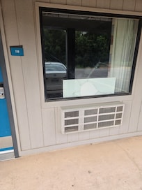 Room had a broken window which they covered with a board