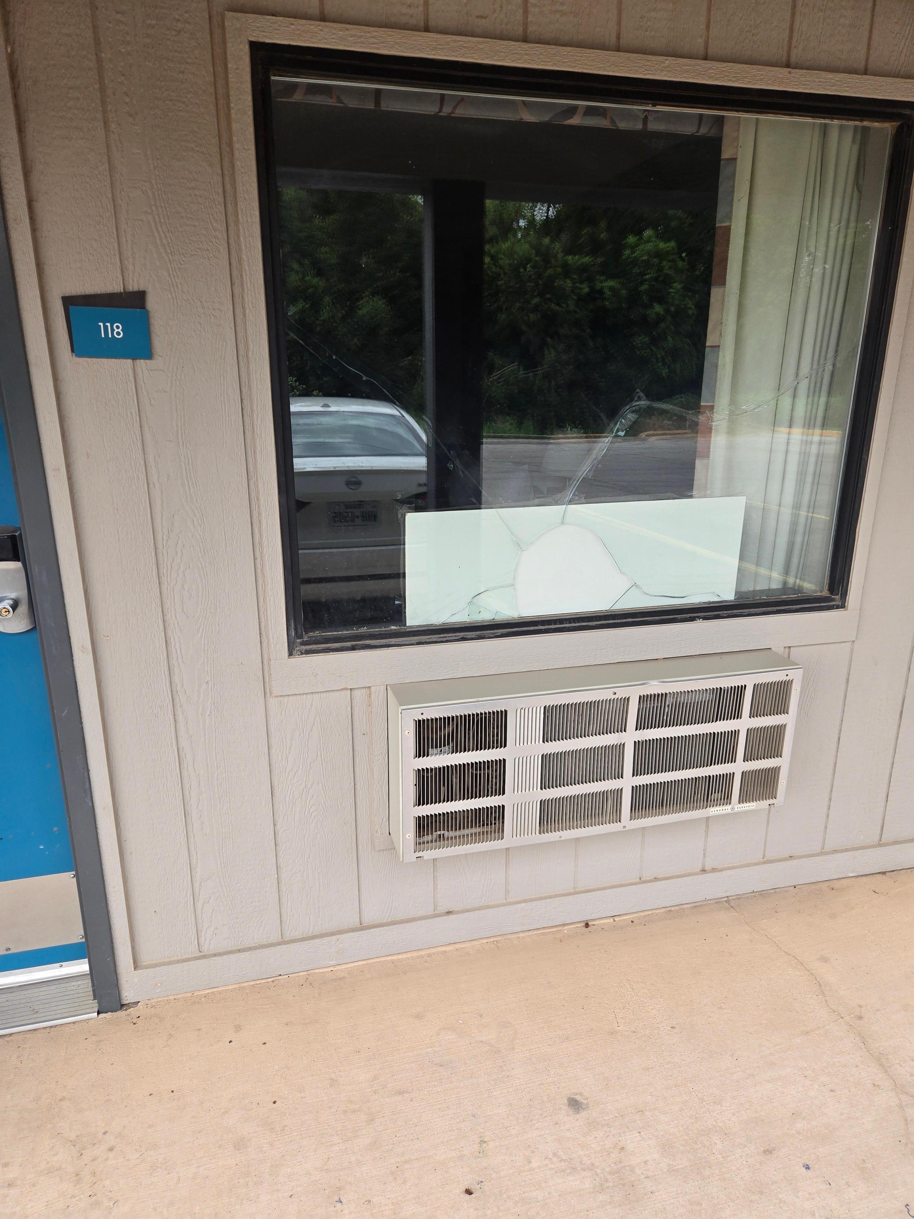 Room had a broken window which they covered with a board