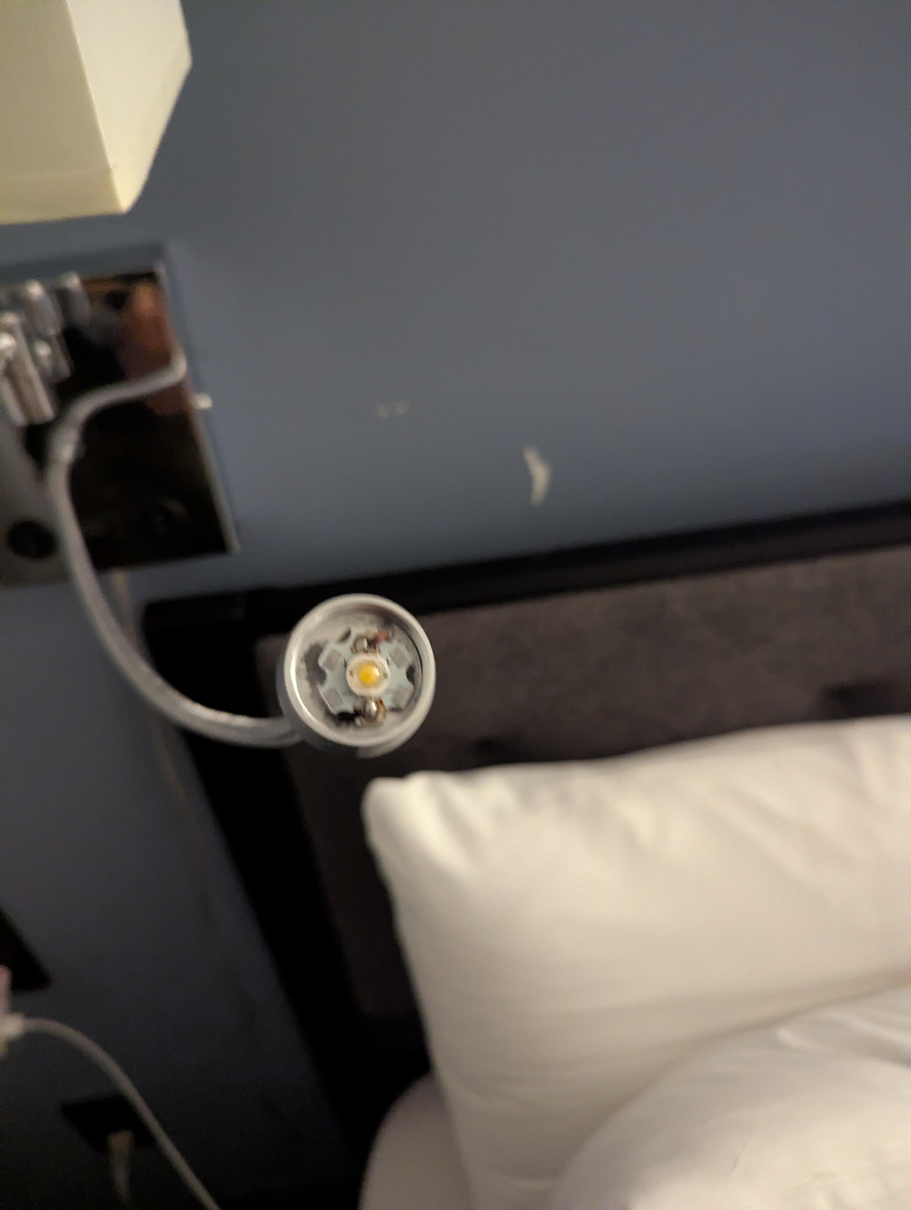 Broken reading light at bedside 