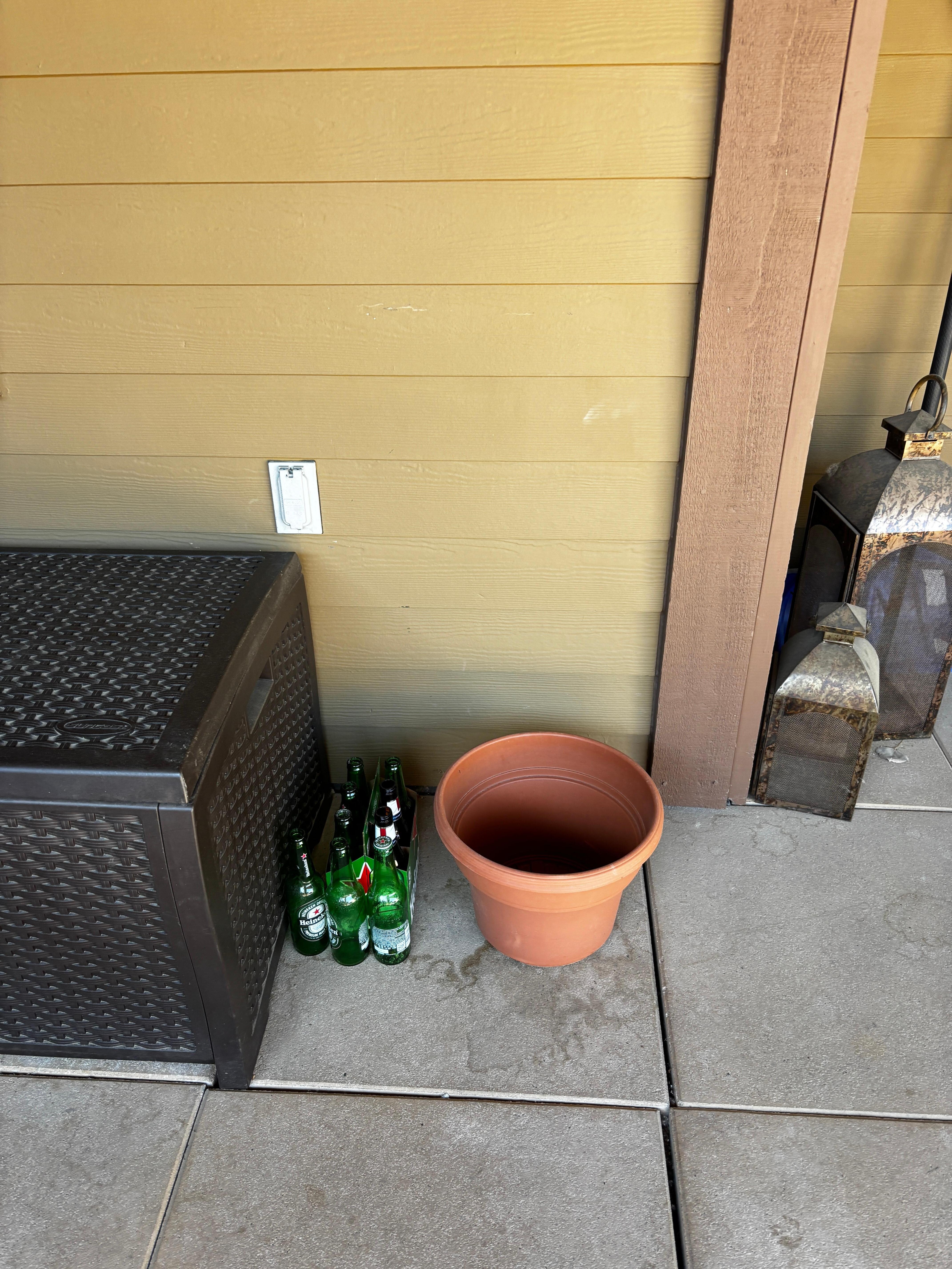 Empty beer bottles on the patio