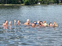 Gunnar the pool, lake, and a lake side restaurant.