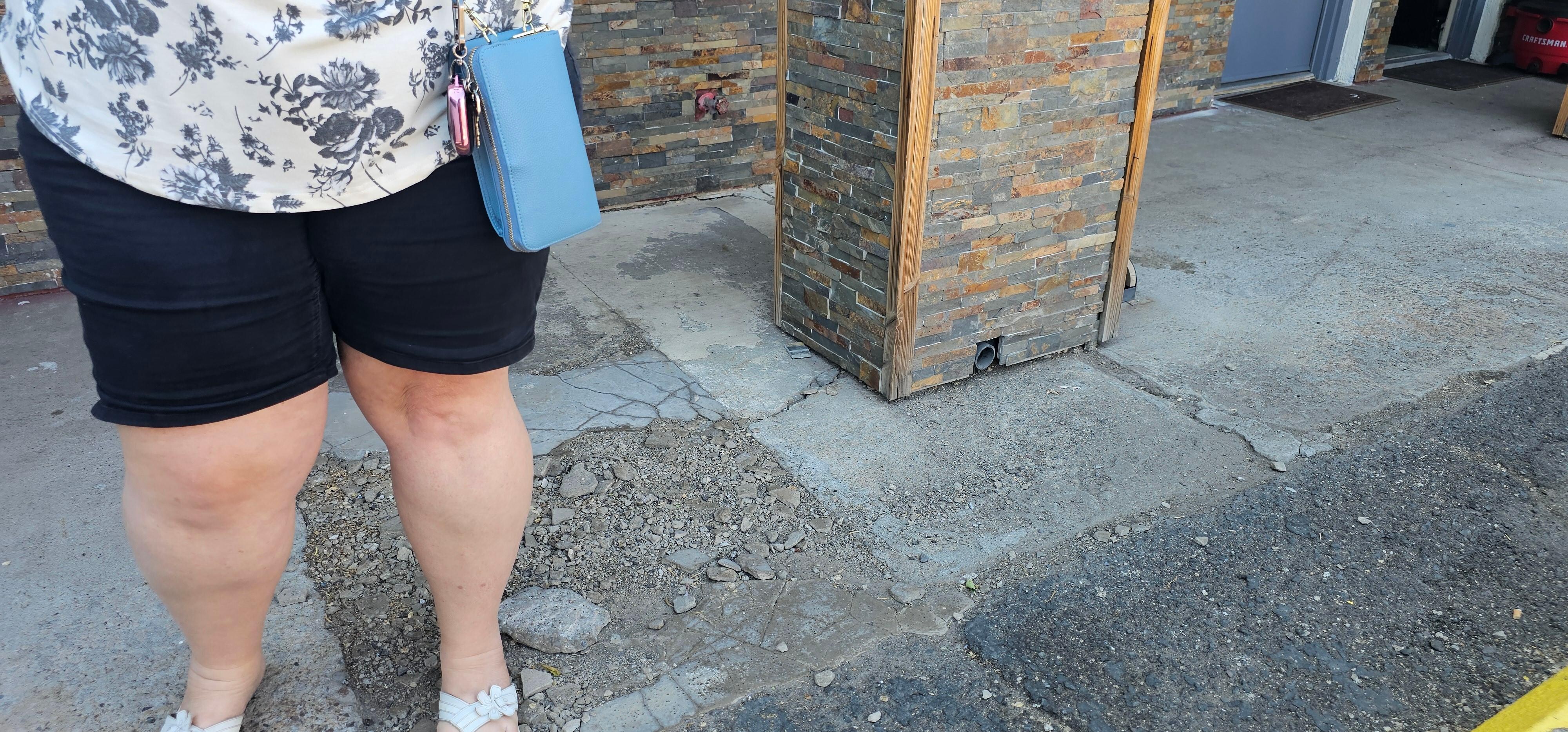Dangerous sidewalk in front of rooms