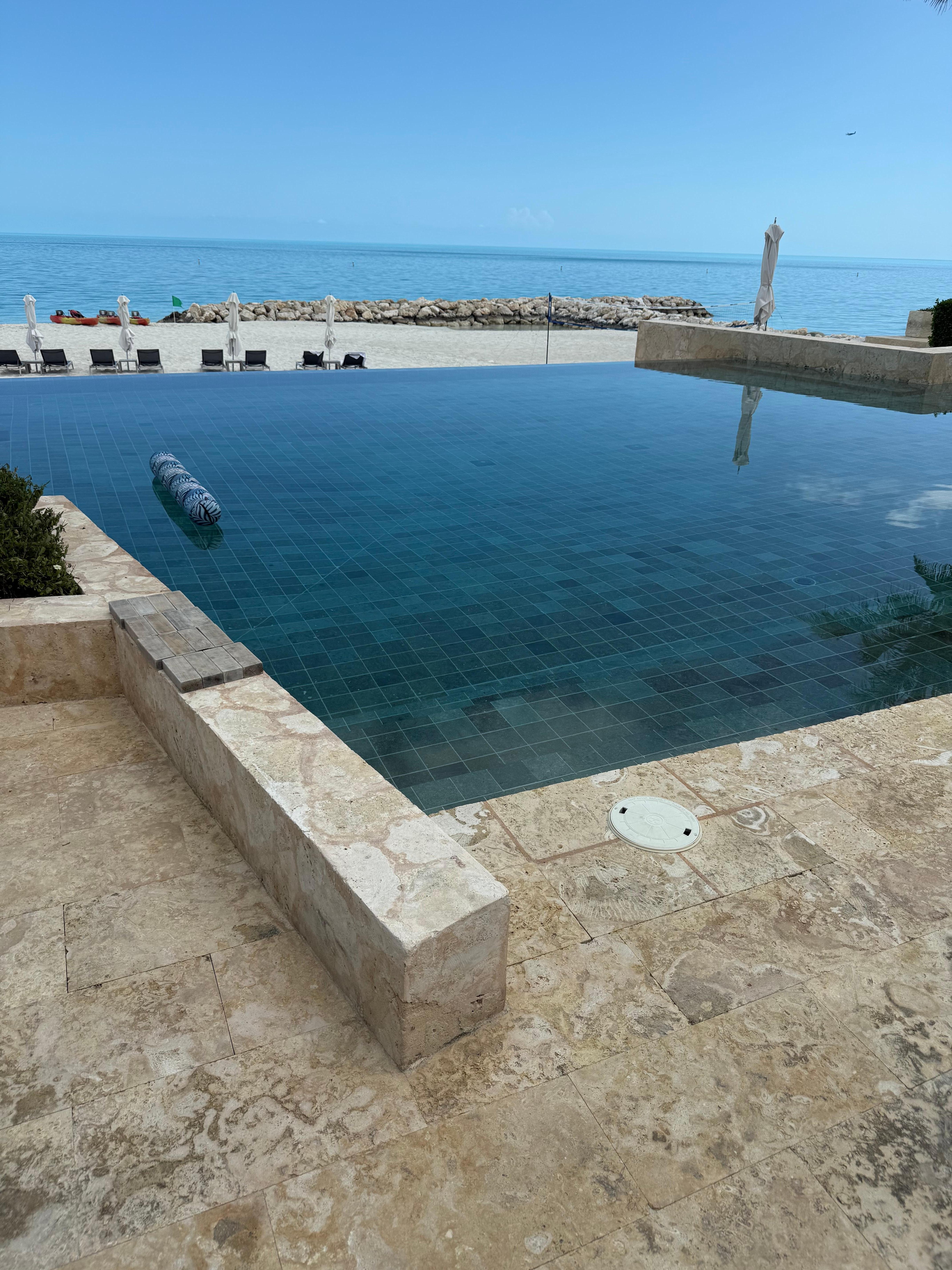 Infiniti pool overlooking beach 