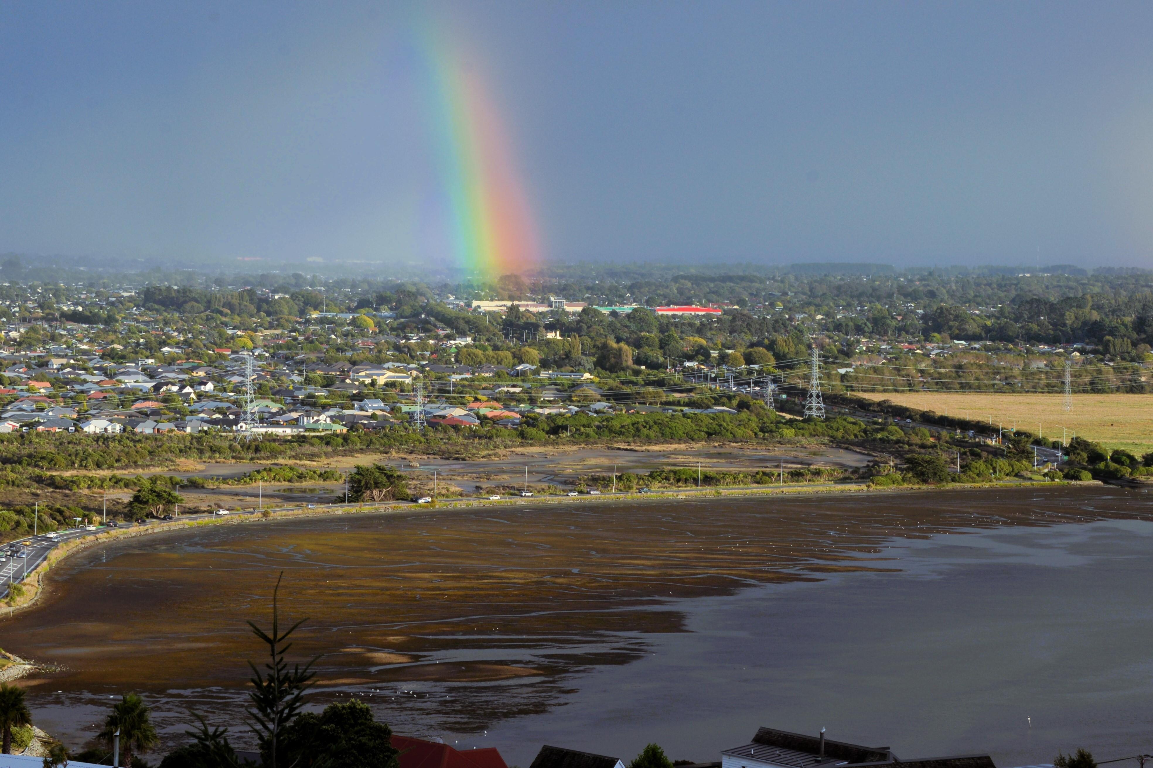 Rainbow looking over th estuary.