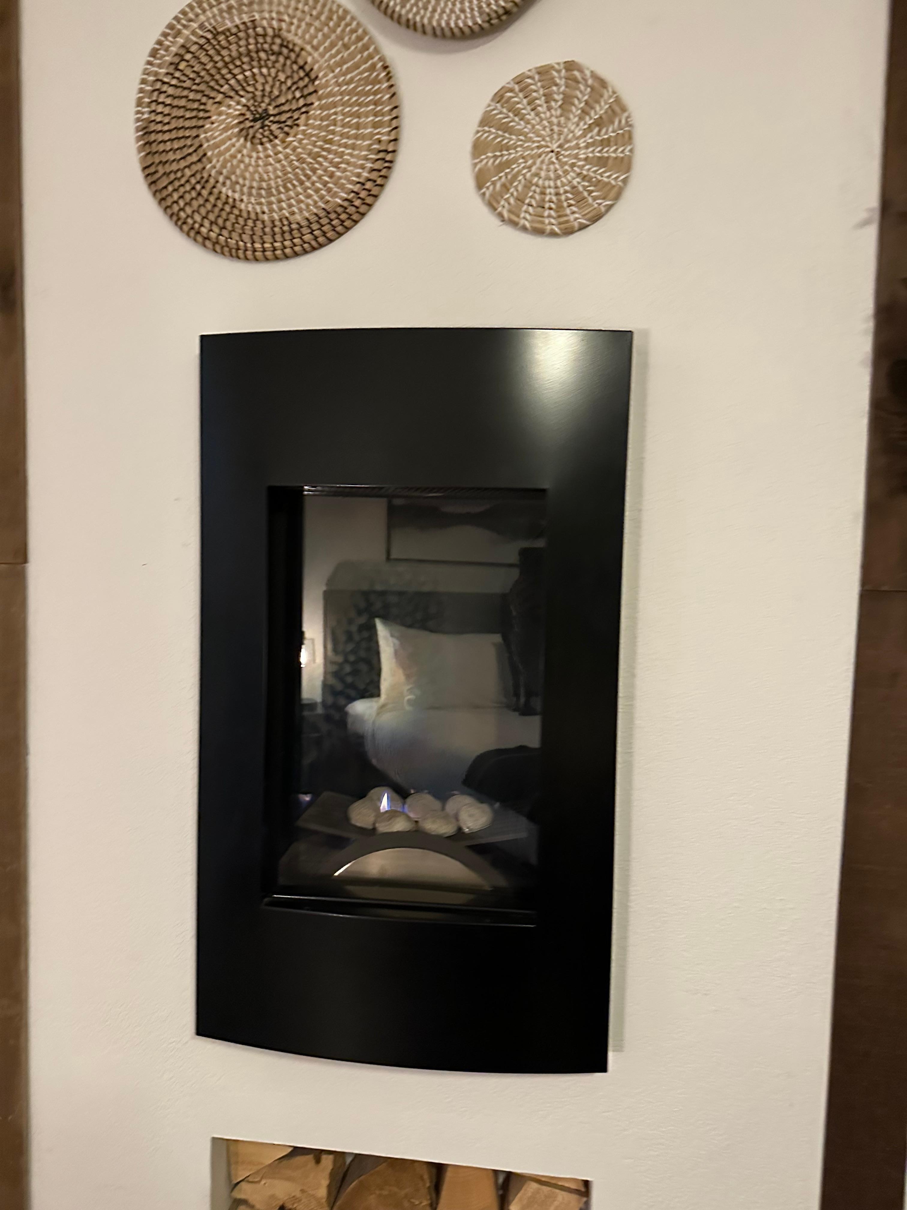 This is the only ‘heating’ in the room — purely decorative and puts out almost no heat.