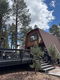 Front of cabin. Front porch also has a grill and flat top. Was great to cook meals while kids played on the deck.