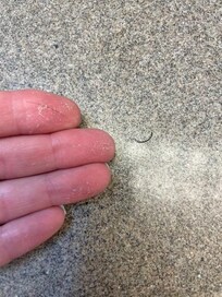 Dirty bathroom countertop. Fake eyelashes on countertop.