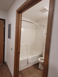 No shower curtain.