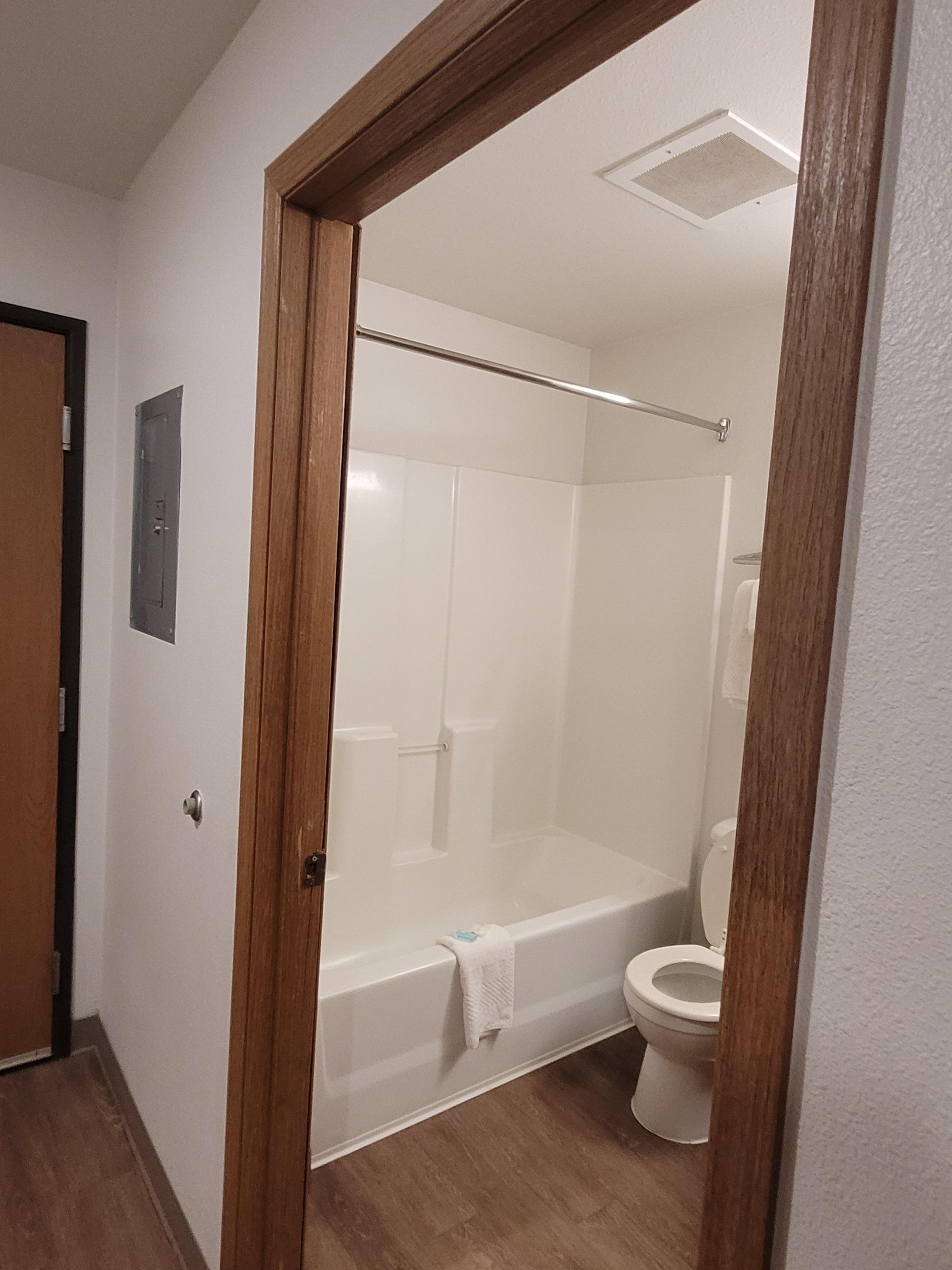 No shower curtain.