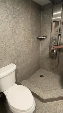 water from the shower spraying directly onto the toilet the second i turned it on