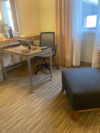King Bed with work center and chaise seating.