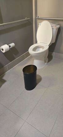 They left the garbage pail in middle of bathroom with no trash liner